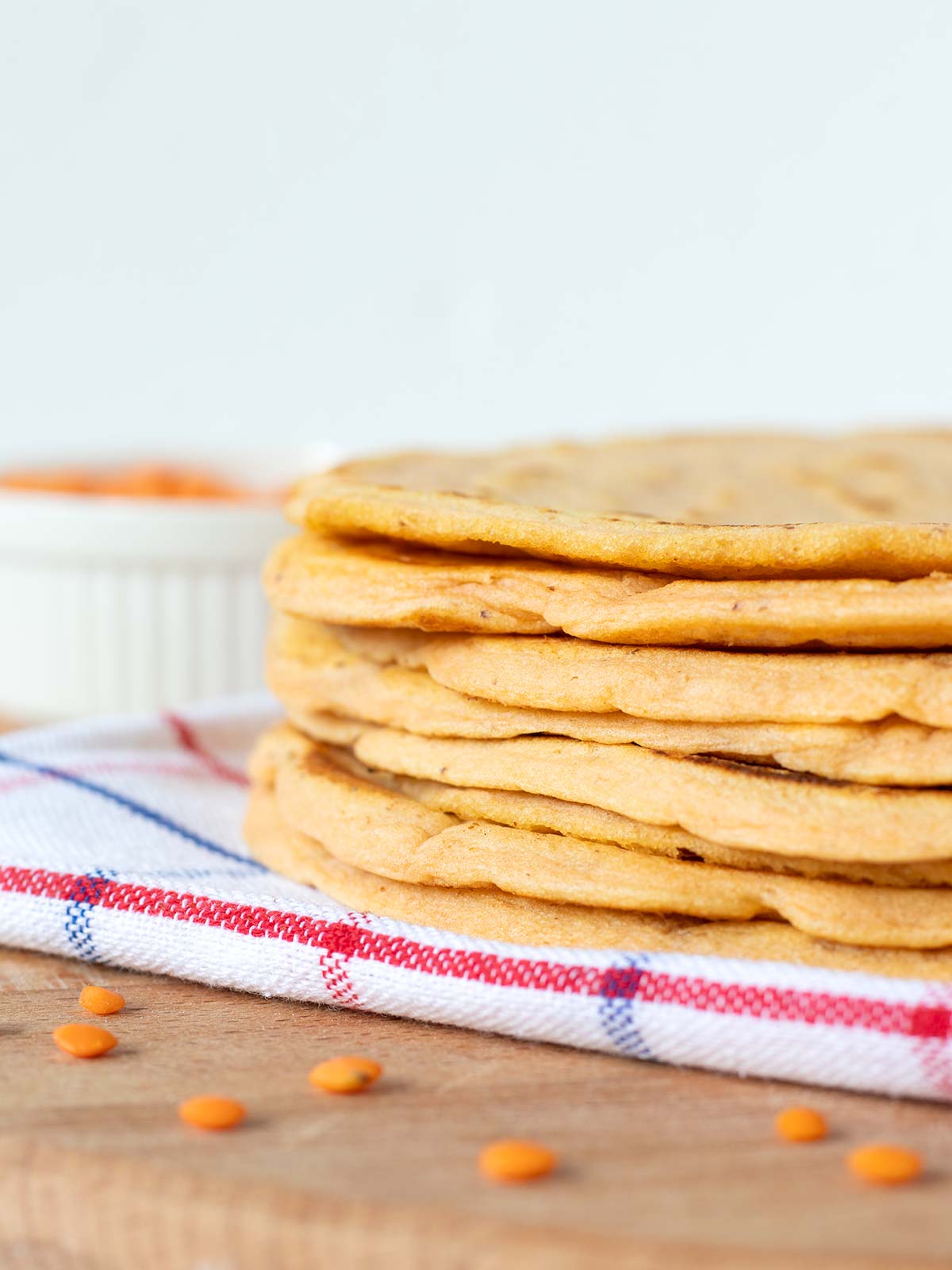 Stack of homemade vegan red tortilla wraps.