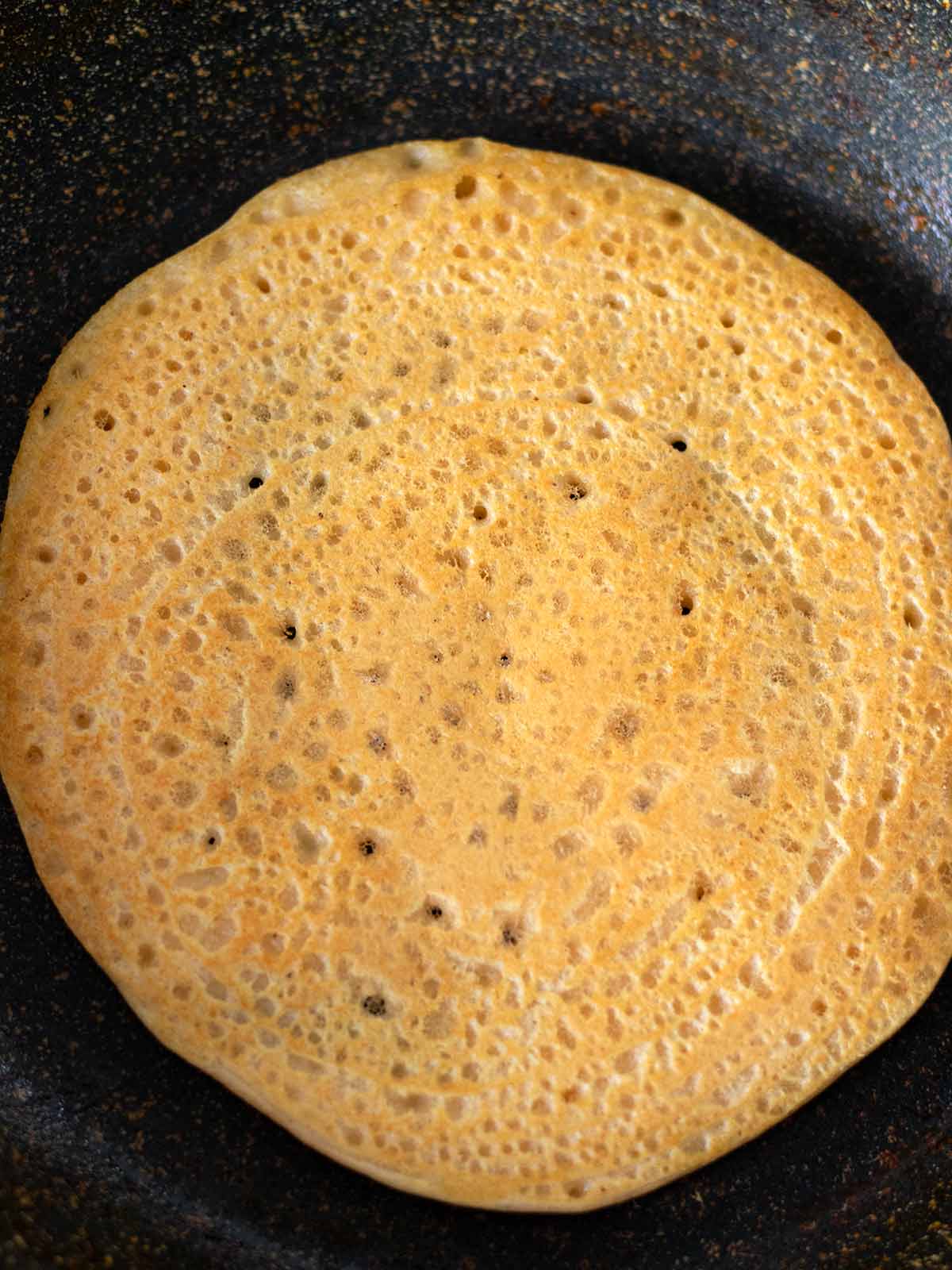 Cooking gluten-free red lentil tortilla wraps.