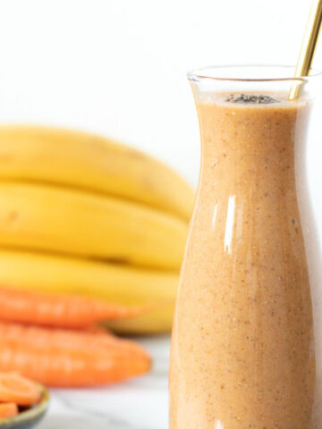 Carrot and banana smoothie with ginger, turmeric, chia seeds and almond milk.