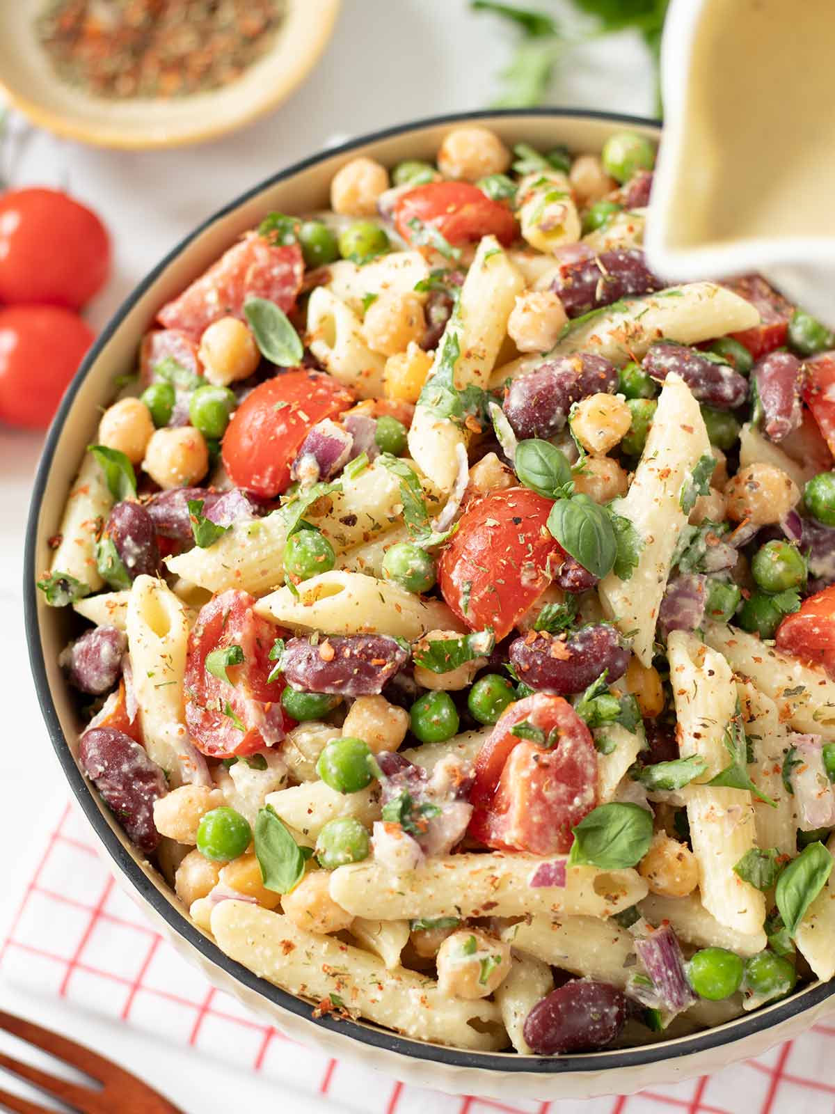 Healthy vegan protein pasta salad with creamy nutritional yeast dressing.