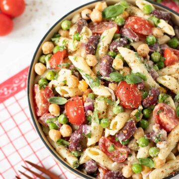 High-protein vegan pasta salad with creamy nutritional yeast dressing.