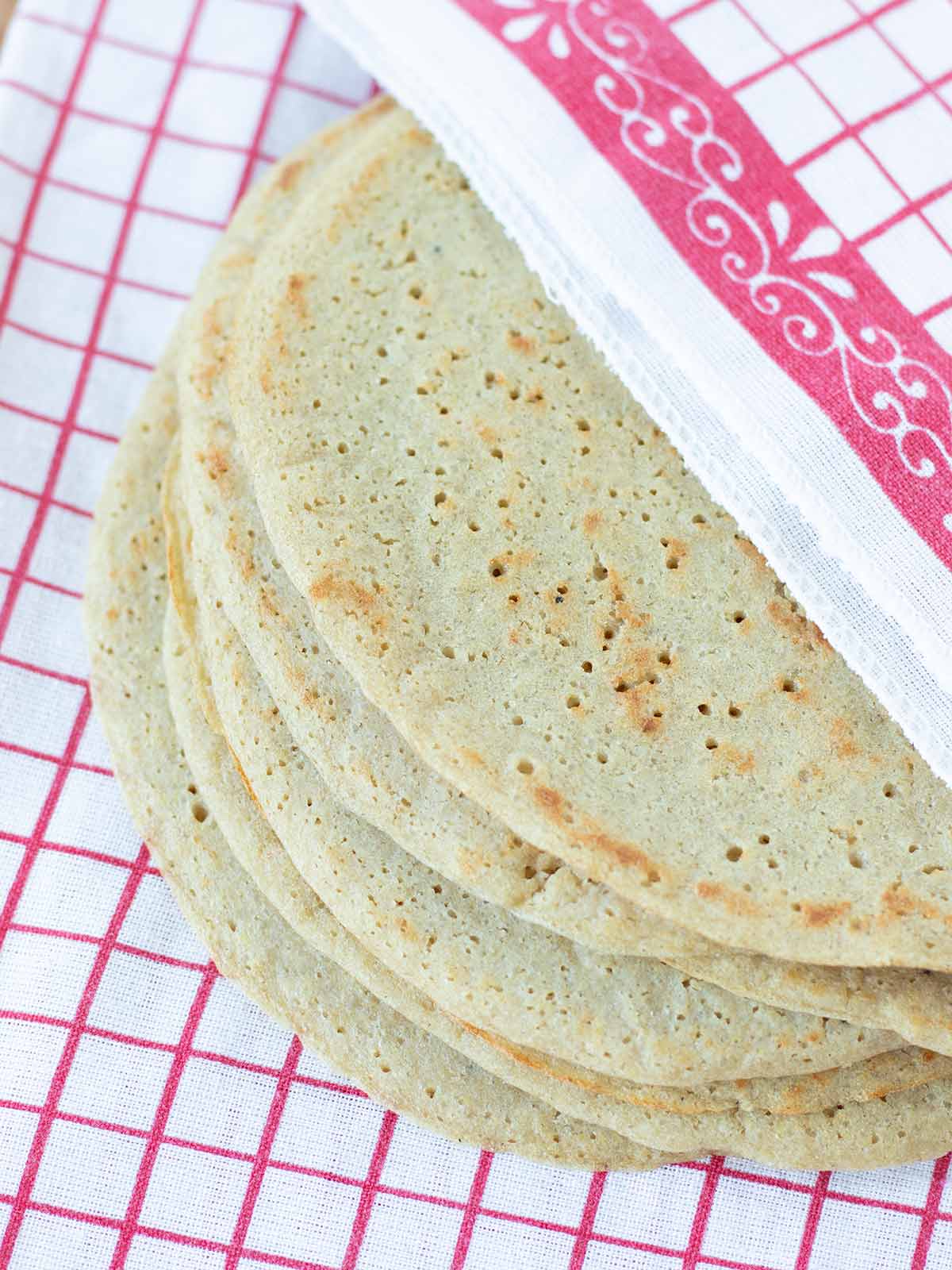 Protein egg-free quinoa wraps in kitchen towel.