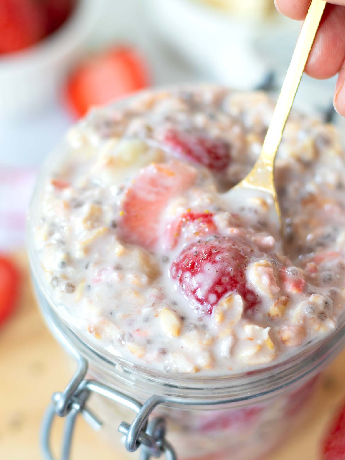 Healthy oatmeal breakfast with strawberries and bananas.