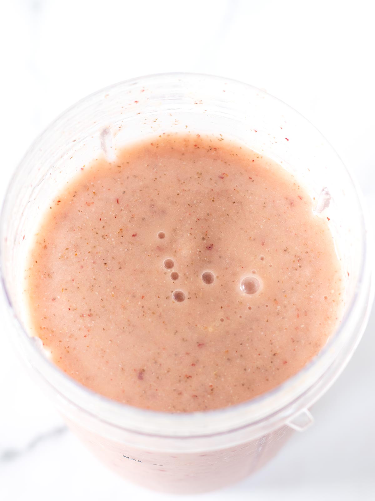 Creamy low-calorie peach and pineapple smoothie.