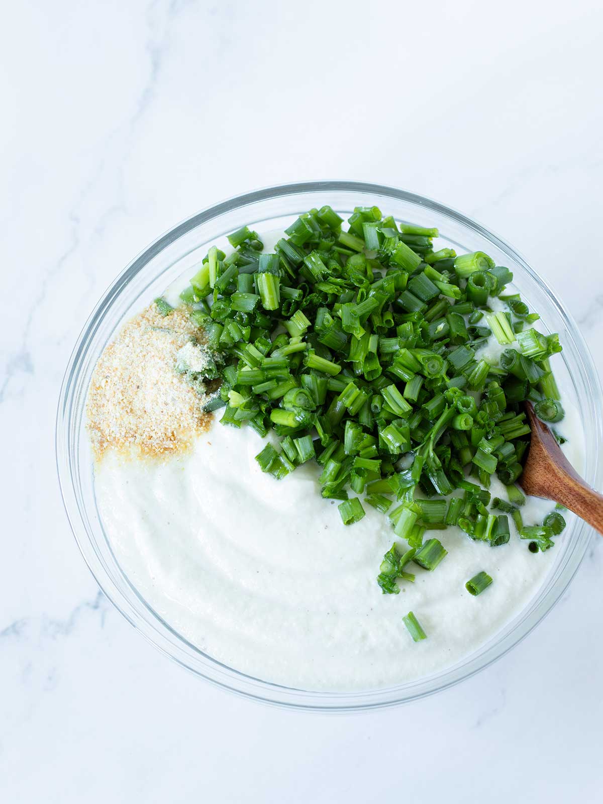 Meal prep of healthy vegan sour cream and chive dip.