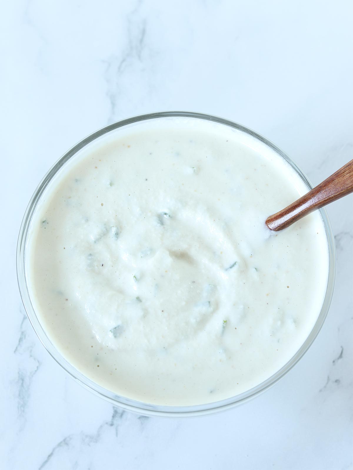 Creamy veggie dip with homemade cashew sour cream and fresh chives.