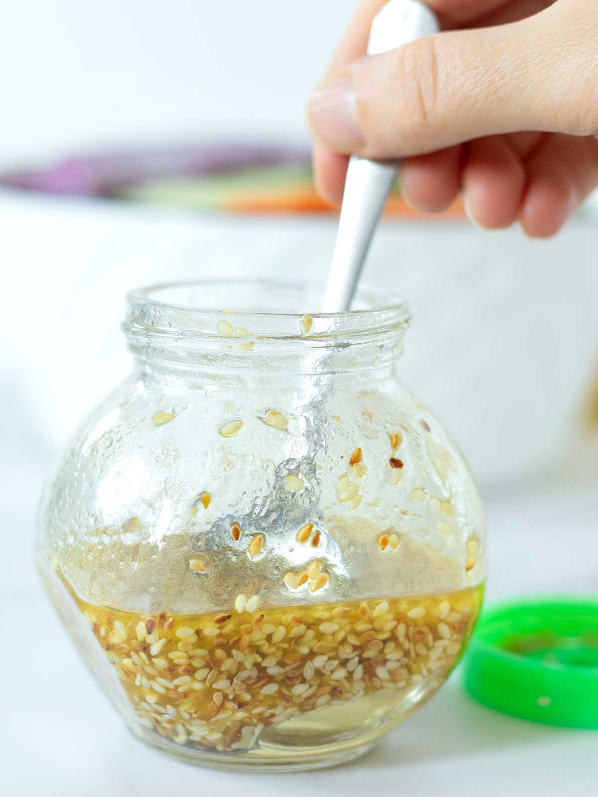 Simple homemade sesame dressing with extra virgin olive oil and apple cider vinegar.