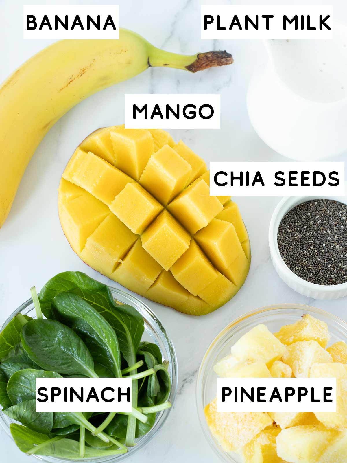 Mango pineapple spinach green smoothie ingredients.