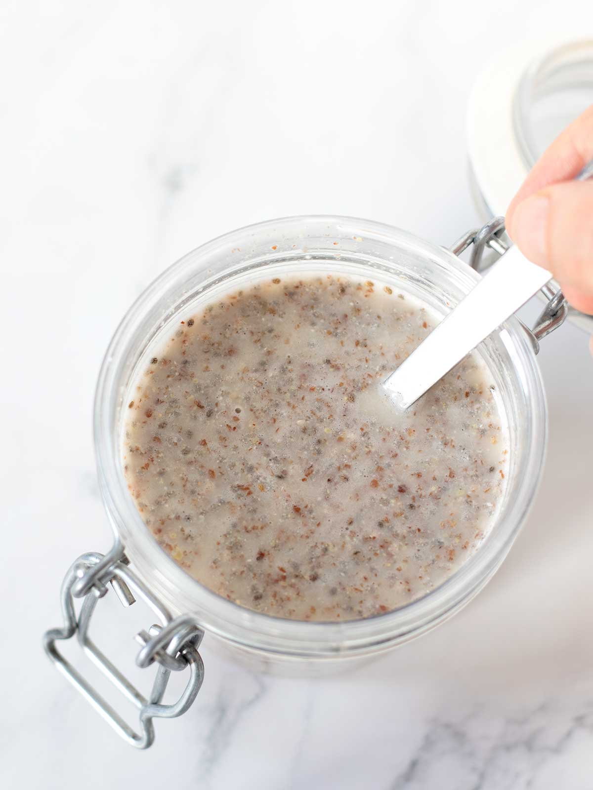 Meal prepping of healthy chia and flax seed pudding.