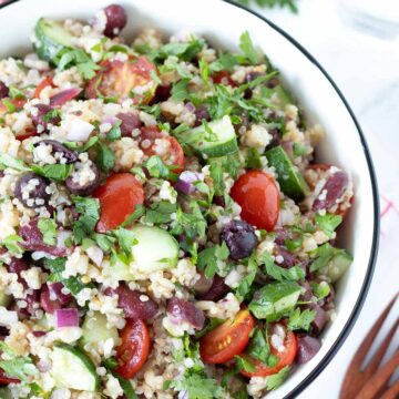 Simple brown rice quinoa salad with red kidney beans, veggies, and lemon olive oil vinaigrette.