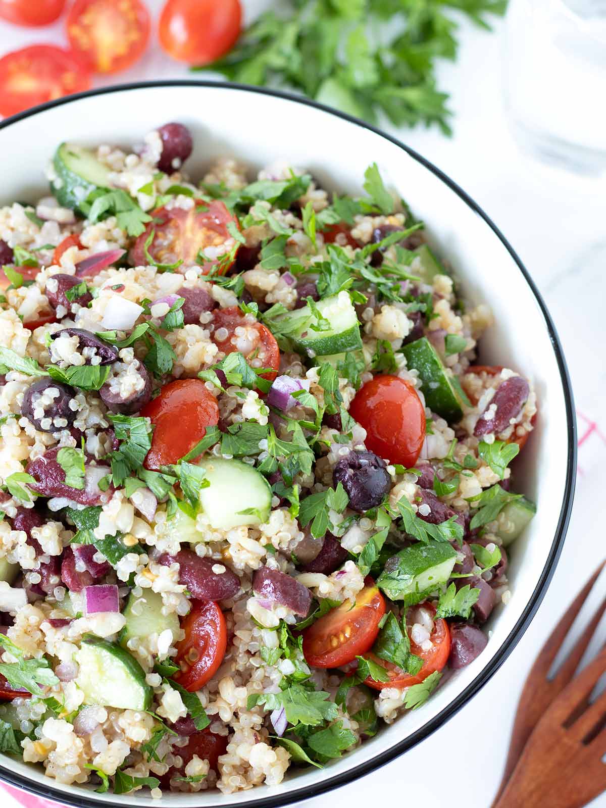 Simple brown rice quinoa salad with red kidney beans, veggies, and lemon olive oil vinaigrette.