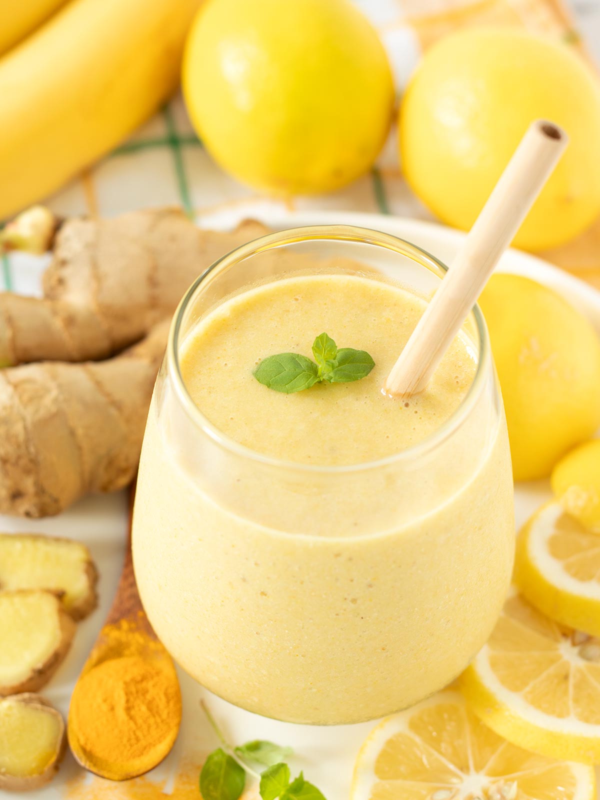 Banana lemon ginger smoothie with turmeric and almond milk.