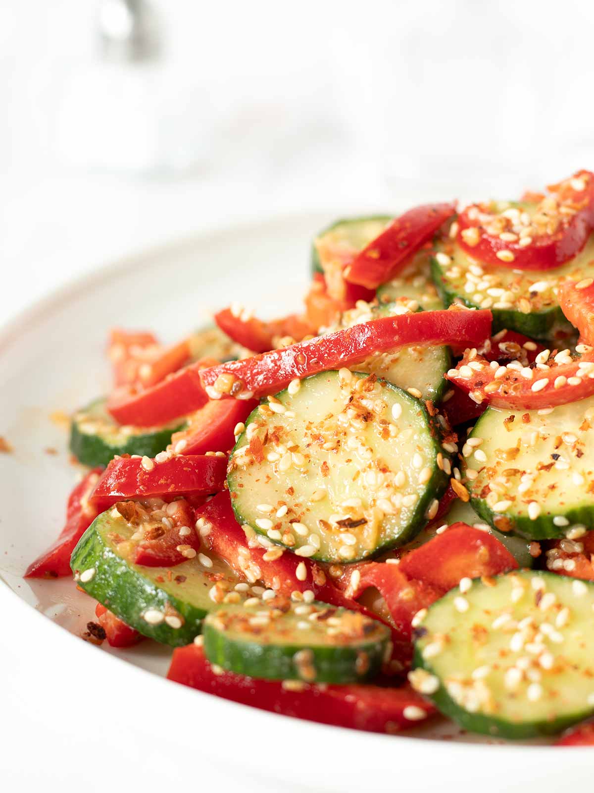 Red pepper cucumber salad with sesame ginger dressing.