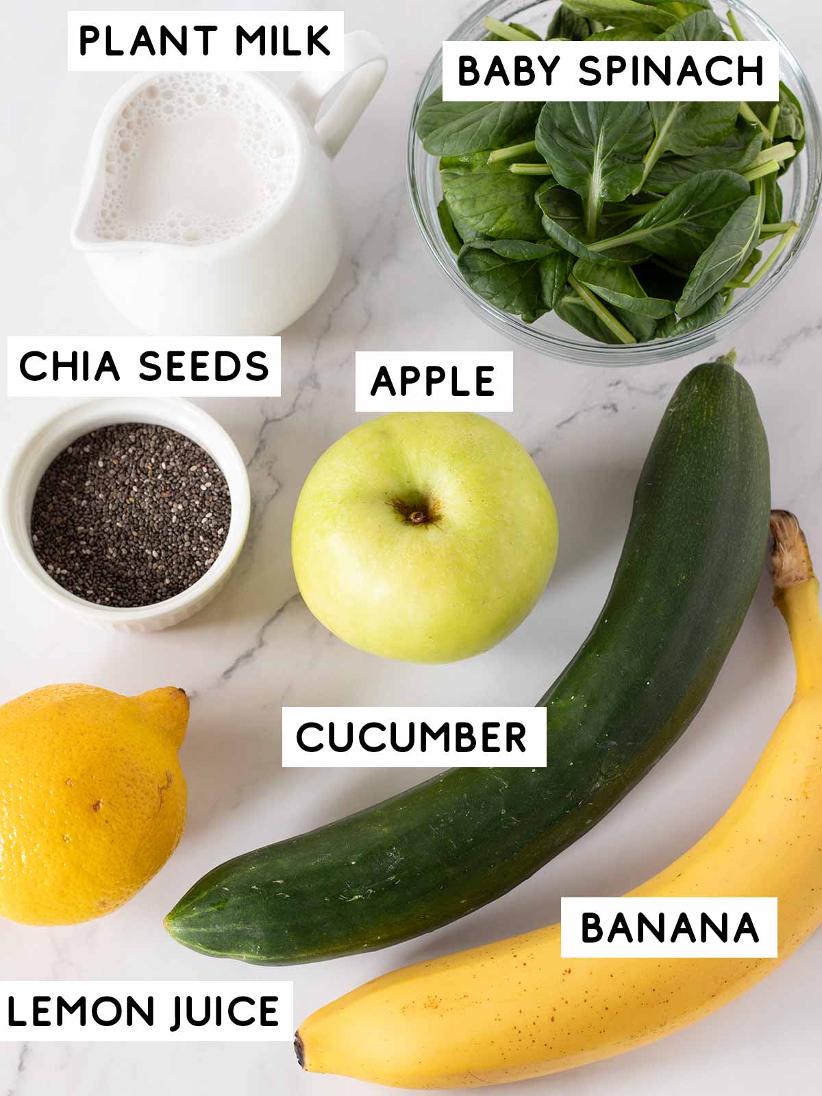 Green cucumber spinach apple smoothie ingredients.