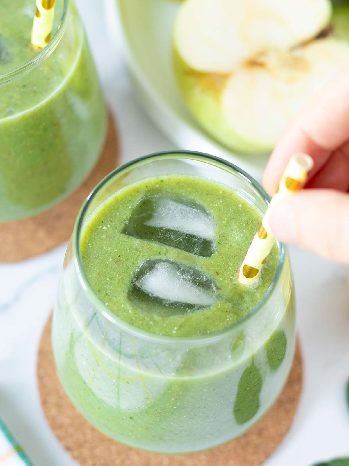 Healthy cucumber apple spinach smoothie with banana  and lemon.