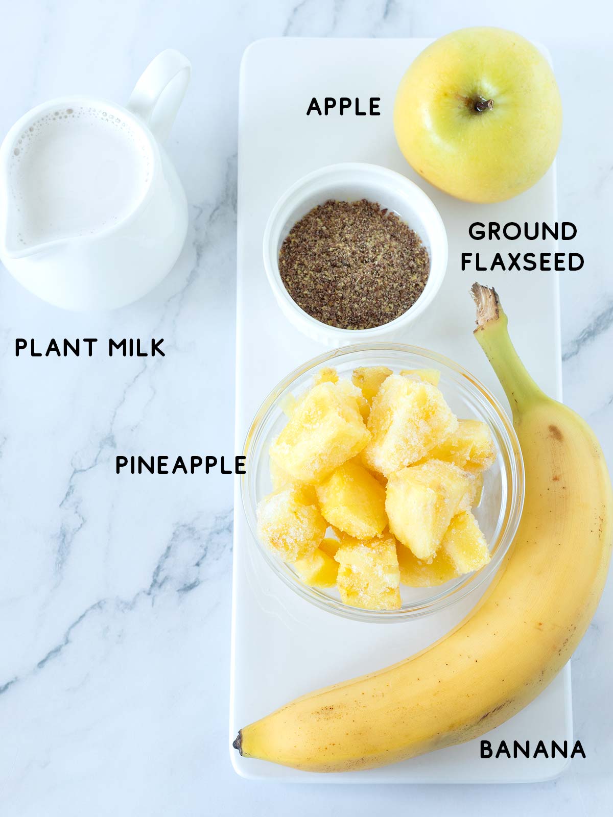 Apple and pineapple smoothie ingredients.
