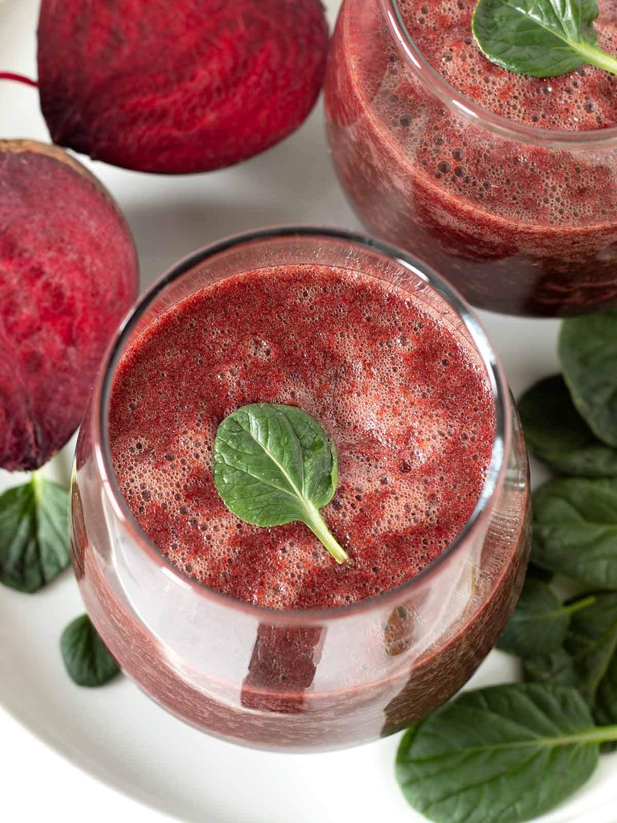 Ginger beet spinach banana smoothie with lemon juice.
