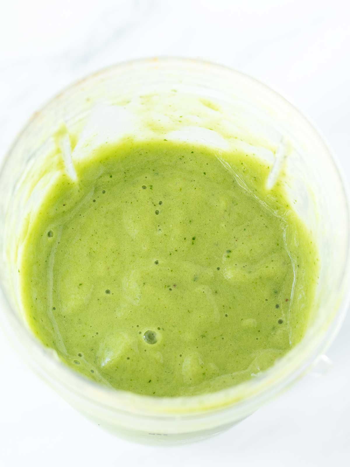 Creamy green smoothie with pineapple and spinach.