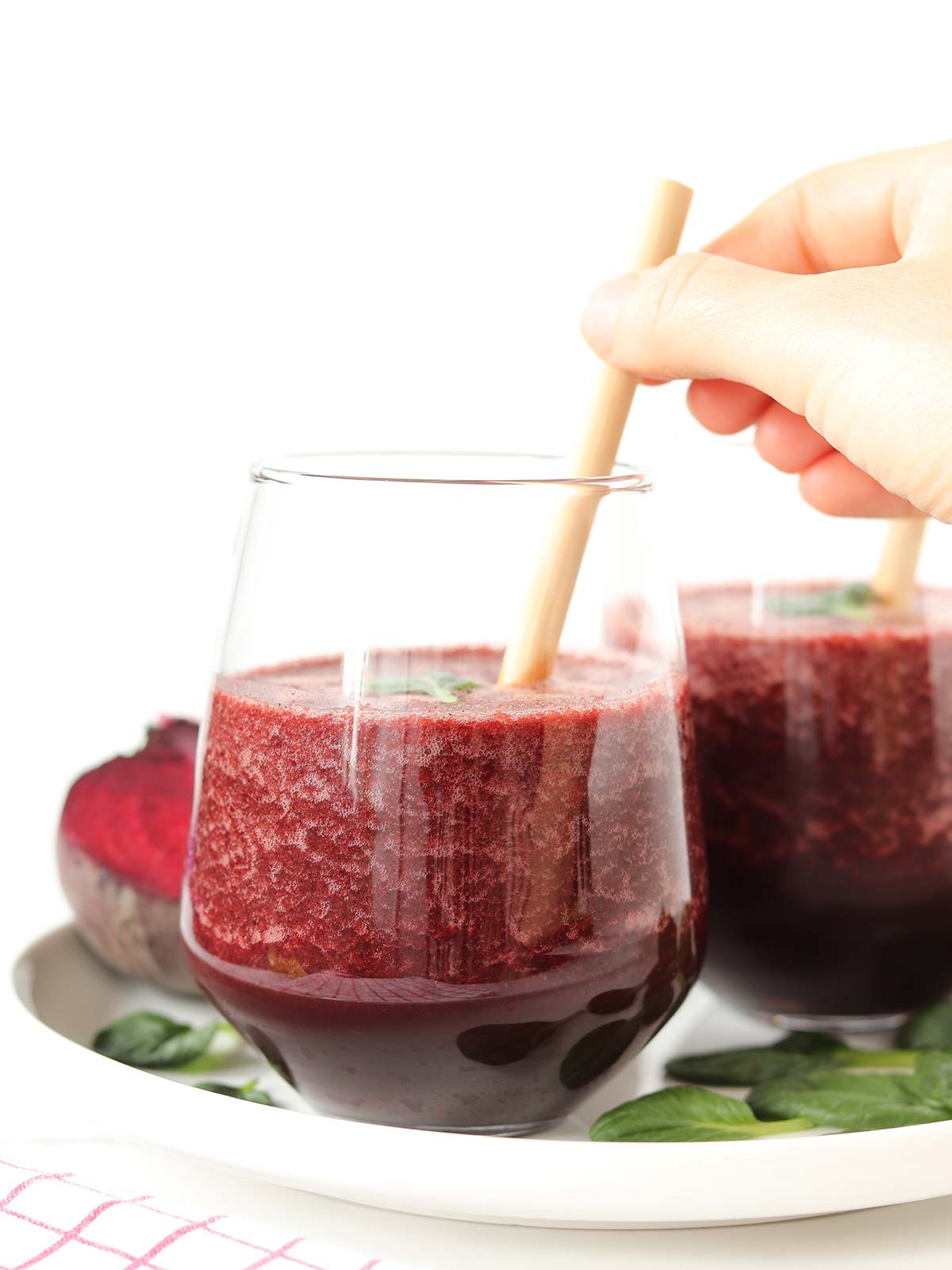 Raw beet spinach smoothie with ginger, banana, and lemon.