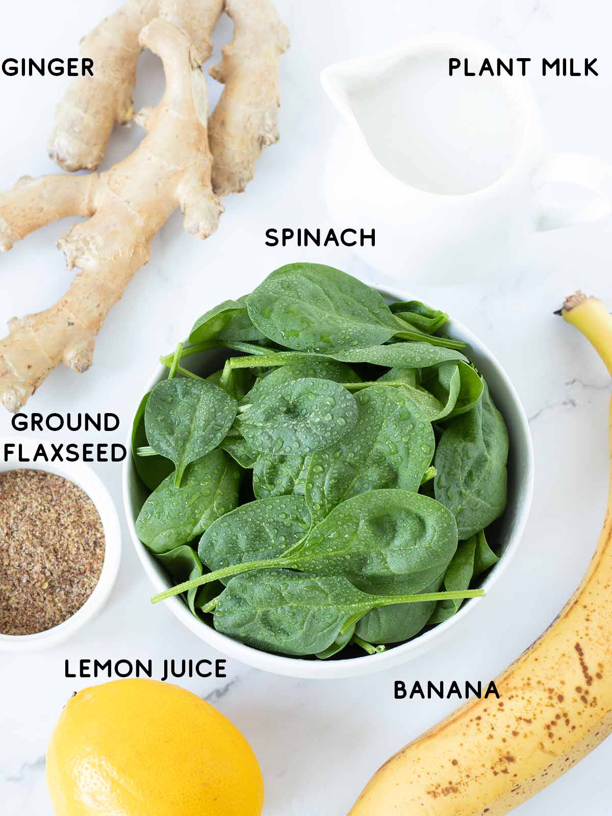 Banana lemon ginger spinach smoothie ingredients.