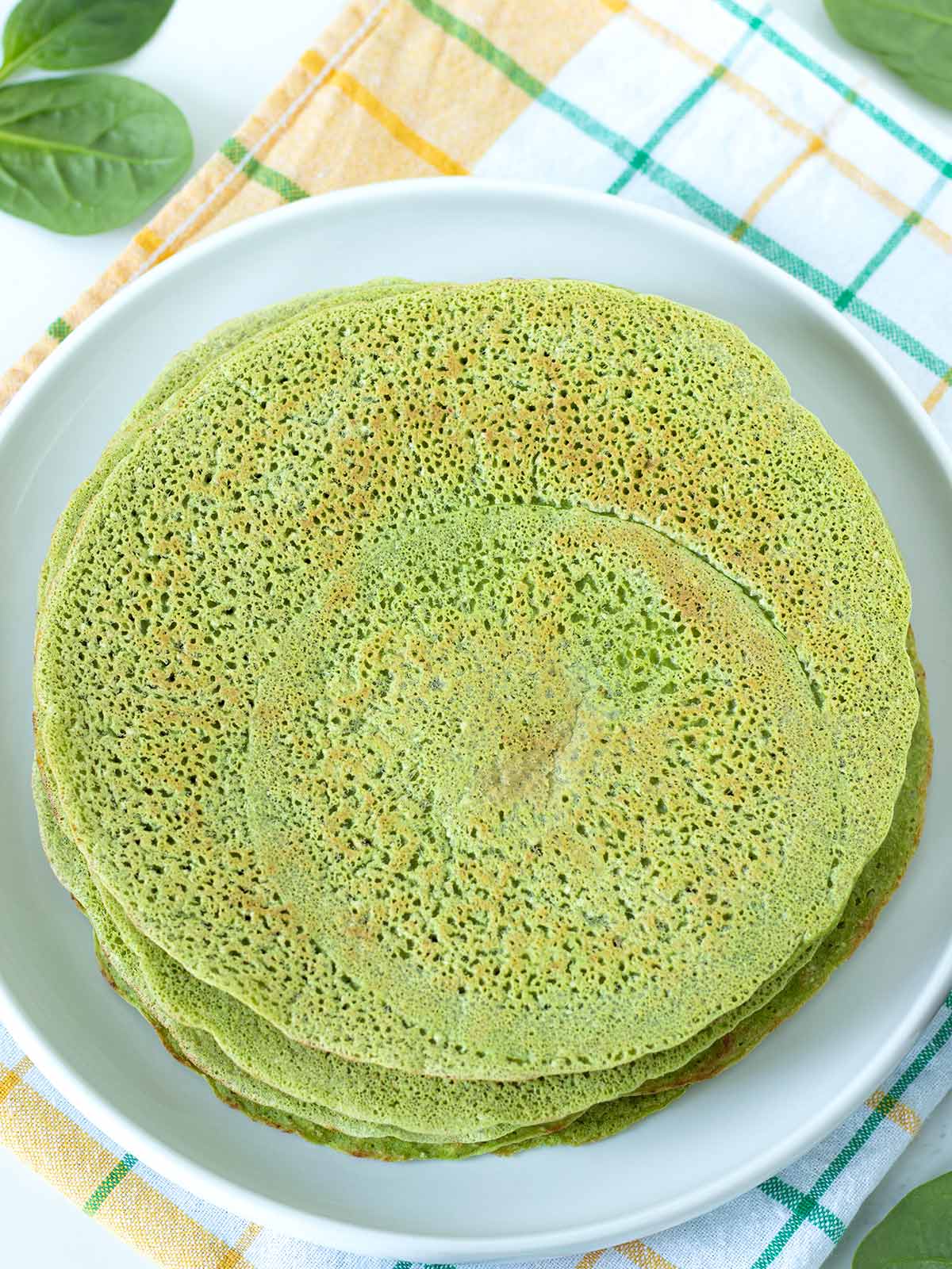 Homemade green spinach tortilla wraps.