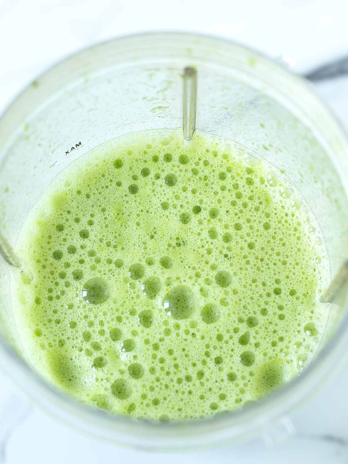Spinach and water blended for gluten-free green wraps.