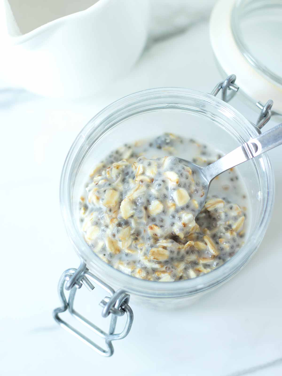 Creamy oatmeal with chia seed and almond milk.