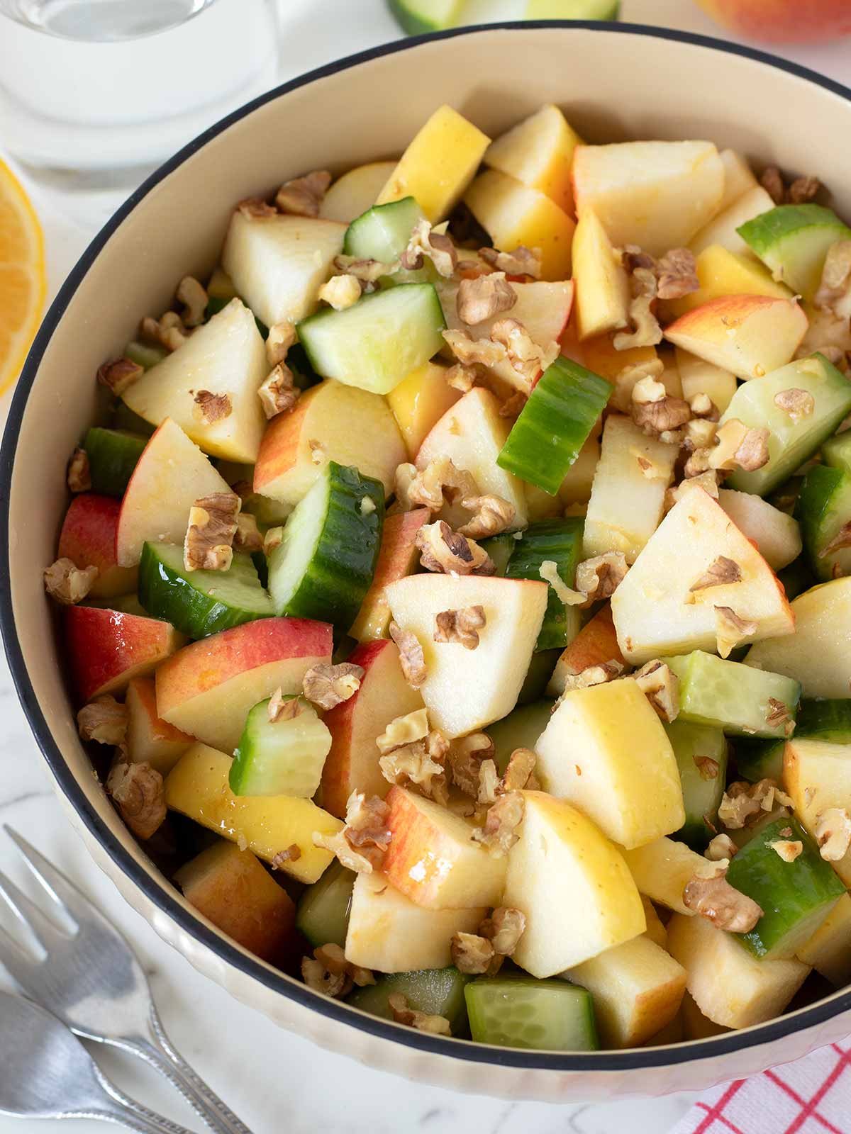 Crunchy apple cucumber salad with walnuts.
