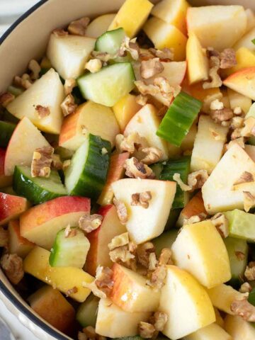Crunchy apple cucumber salad with walnuts.