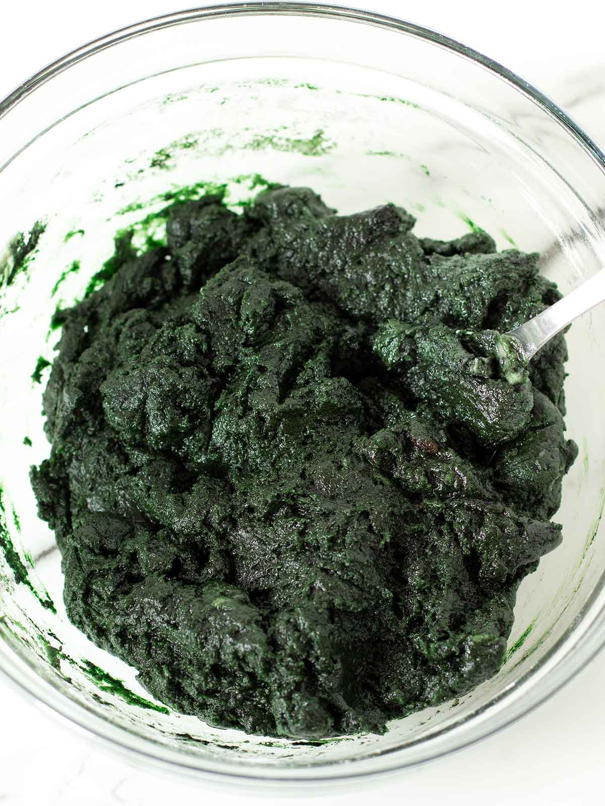 Green spirulina powder cookies batter.