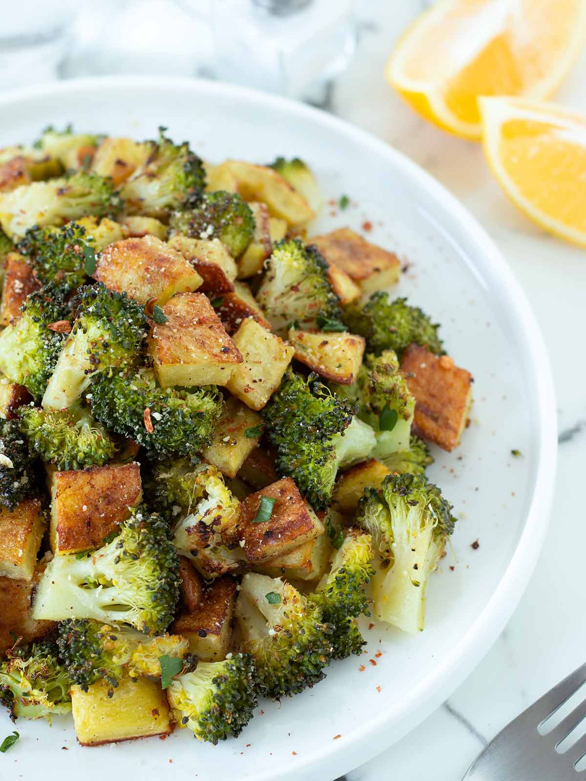 Potato and broccoli bake with vegan parmesan cheese.