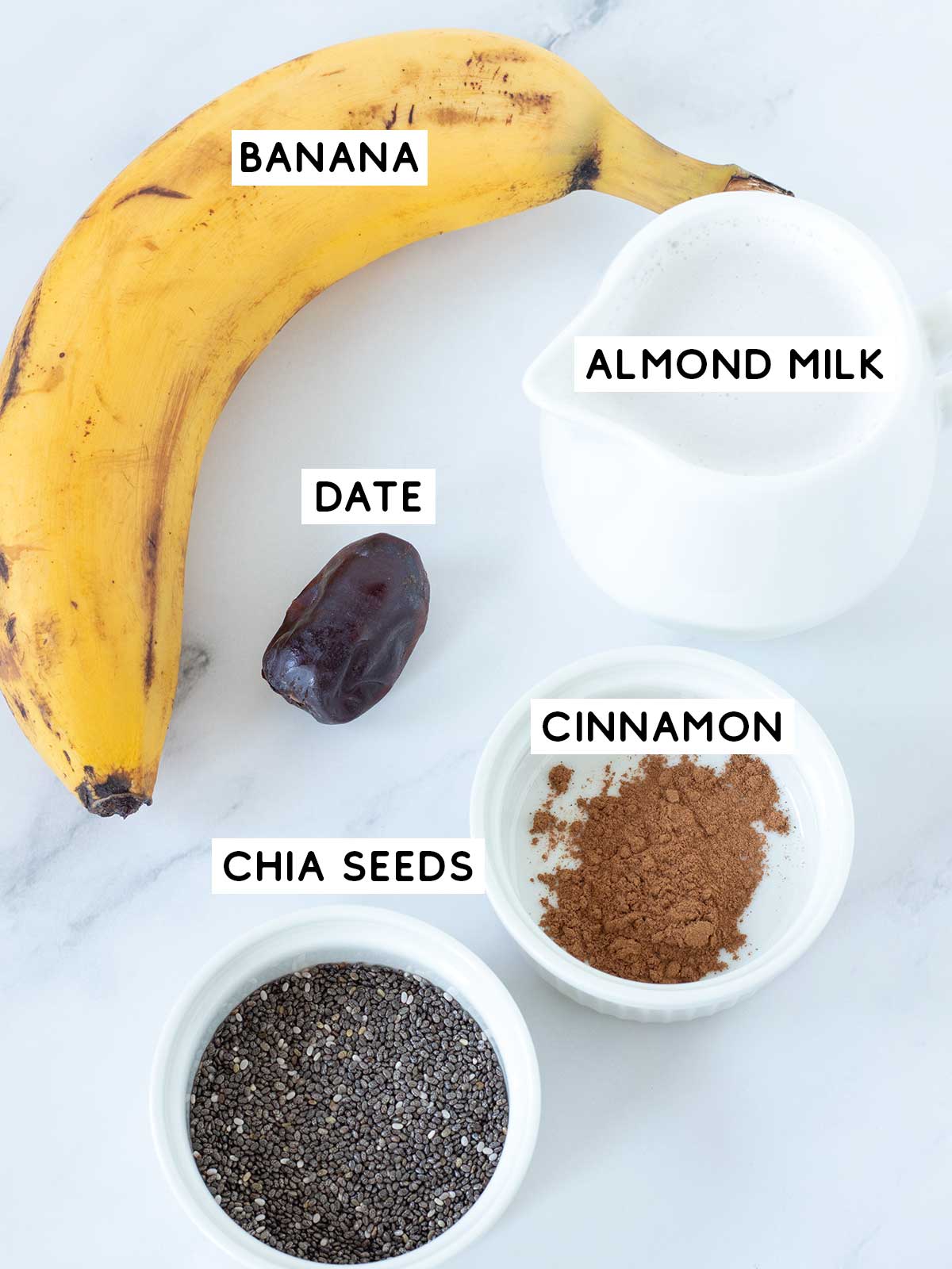 Plant-based ingredients for cinnamon banana smoothie.