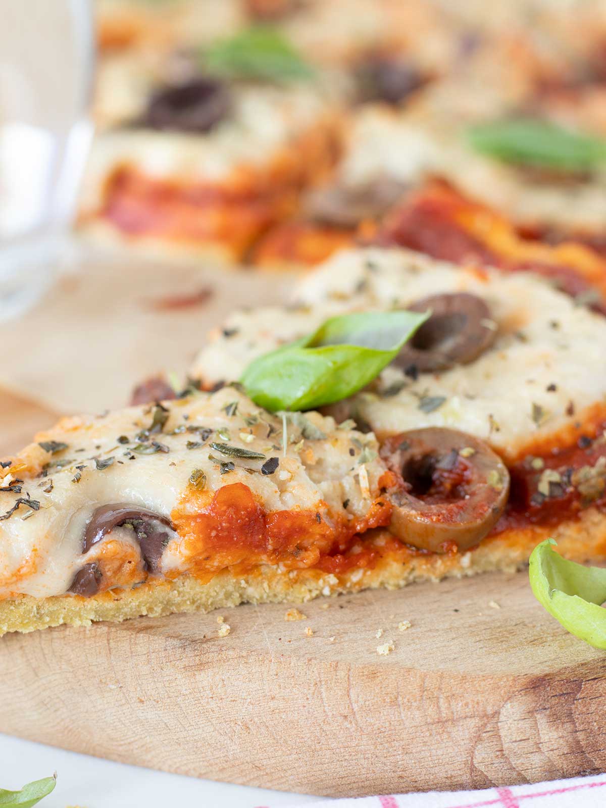 Yeast-free chickpea flour pizza with homemade vegan mozzarella.