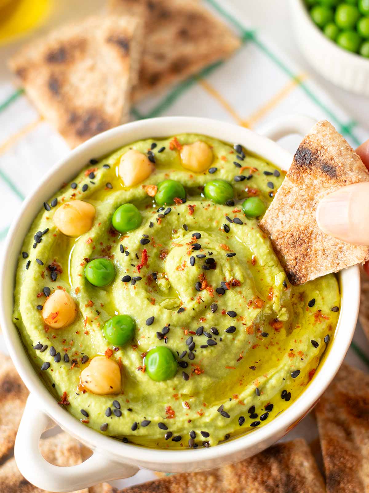 Green pea hummus with pita bread.