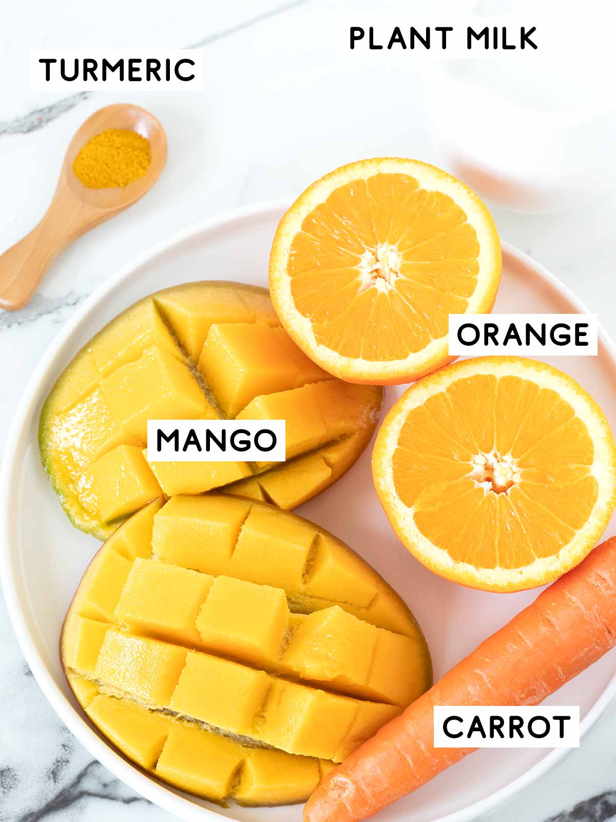 Orange mango smoothie ingredients.