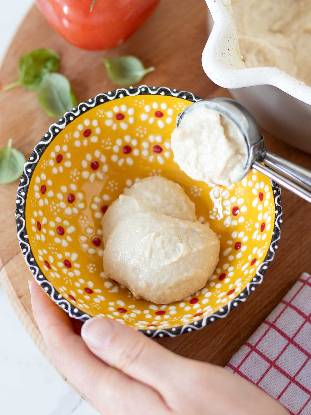 Homemade vegan mozzarella cheese (plant-based alternative).