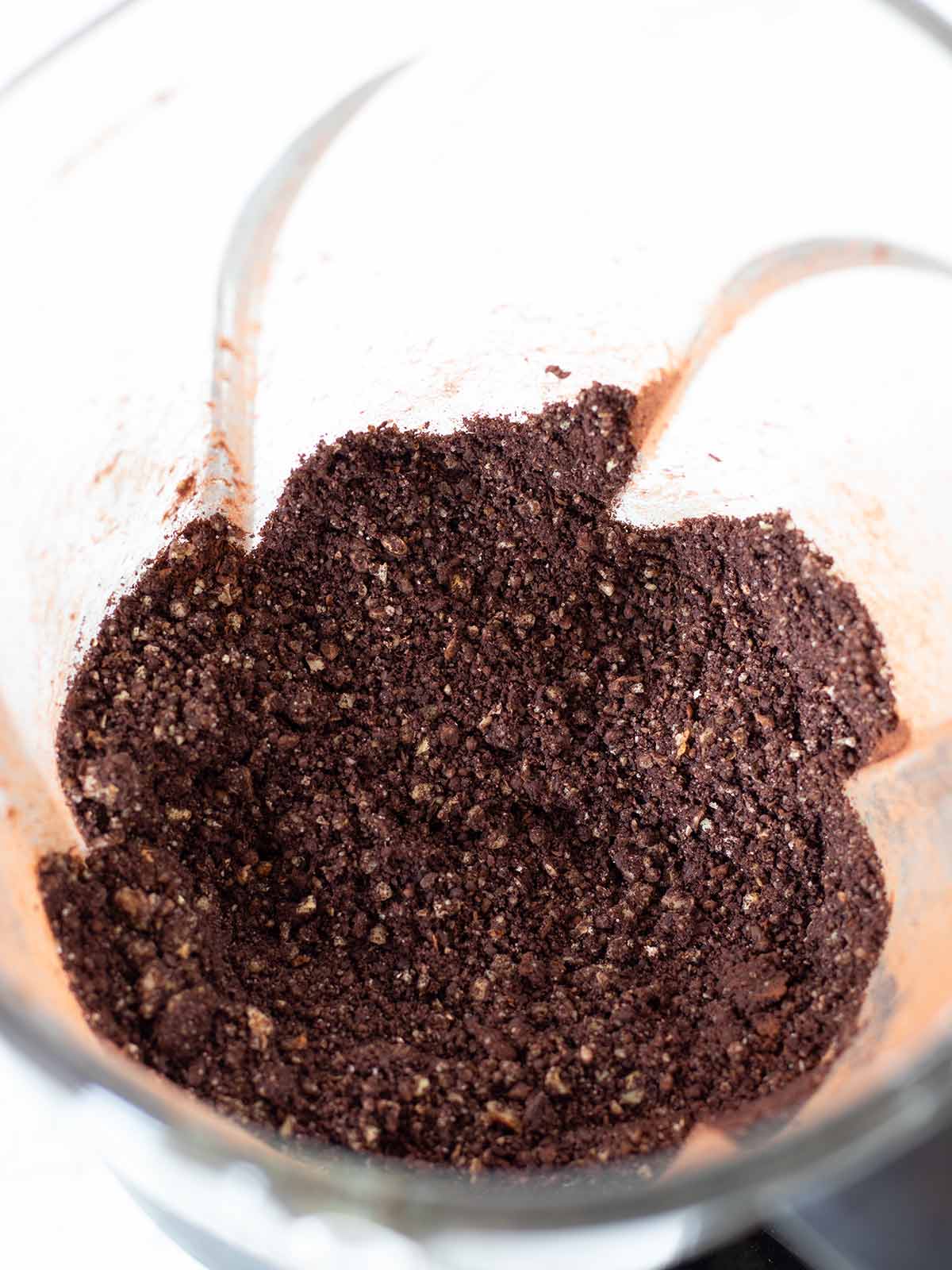 Dry ingredients for raw date cocoa brownies with walnuts.