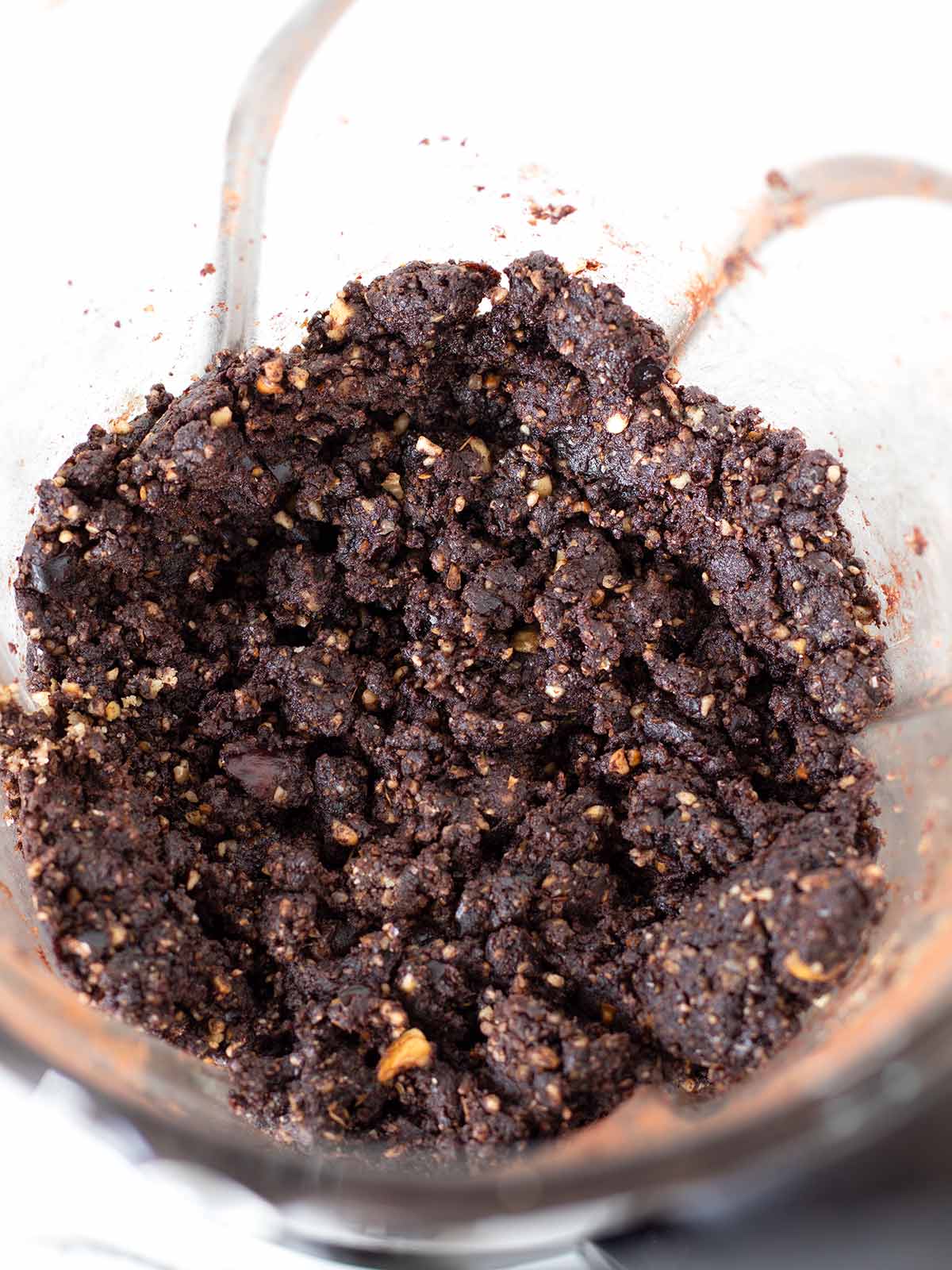 Vegan dough for raw date walnut brownies.
