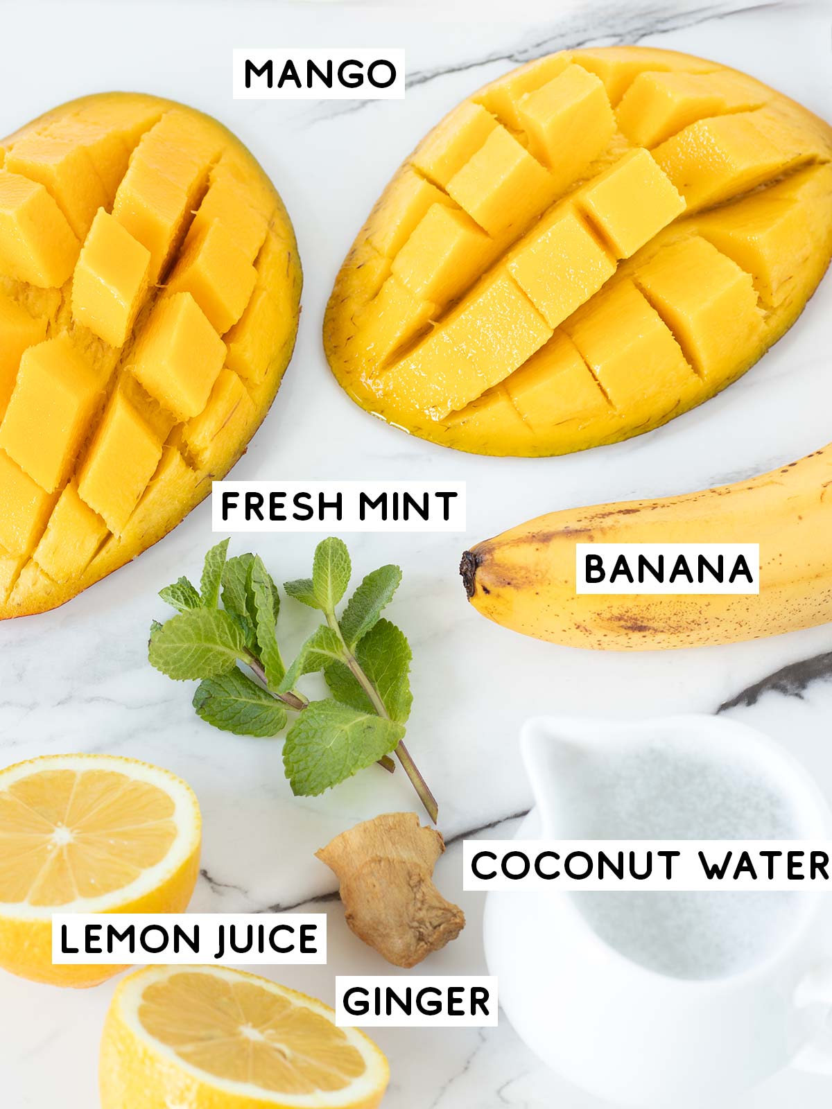 Banana mango coconut water smoothie ingredients.