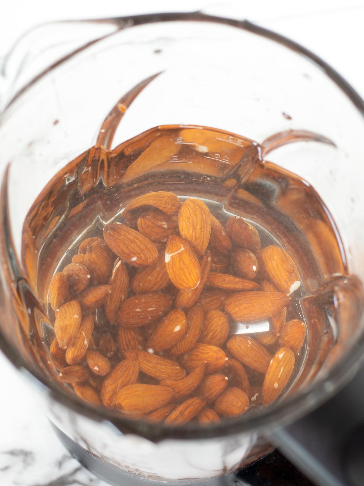 Raw almonds and water in a blender.
