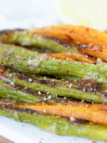 Roasted asparagus and carrots with vegan parmesan.