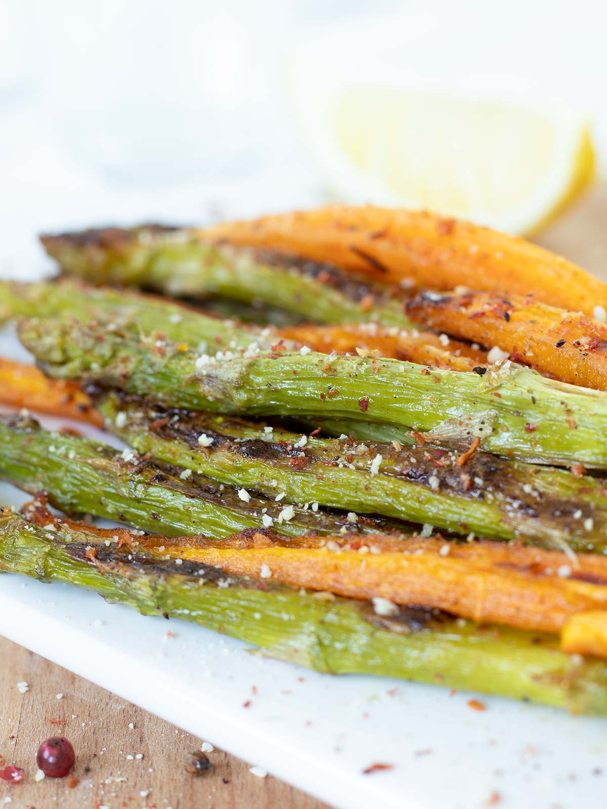 Roasted asparagus and carrots with vegan parmesan.