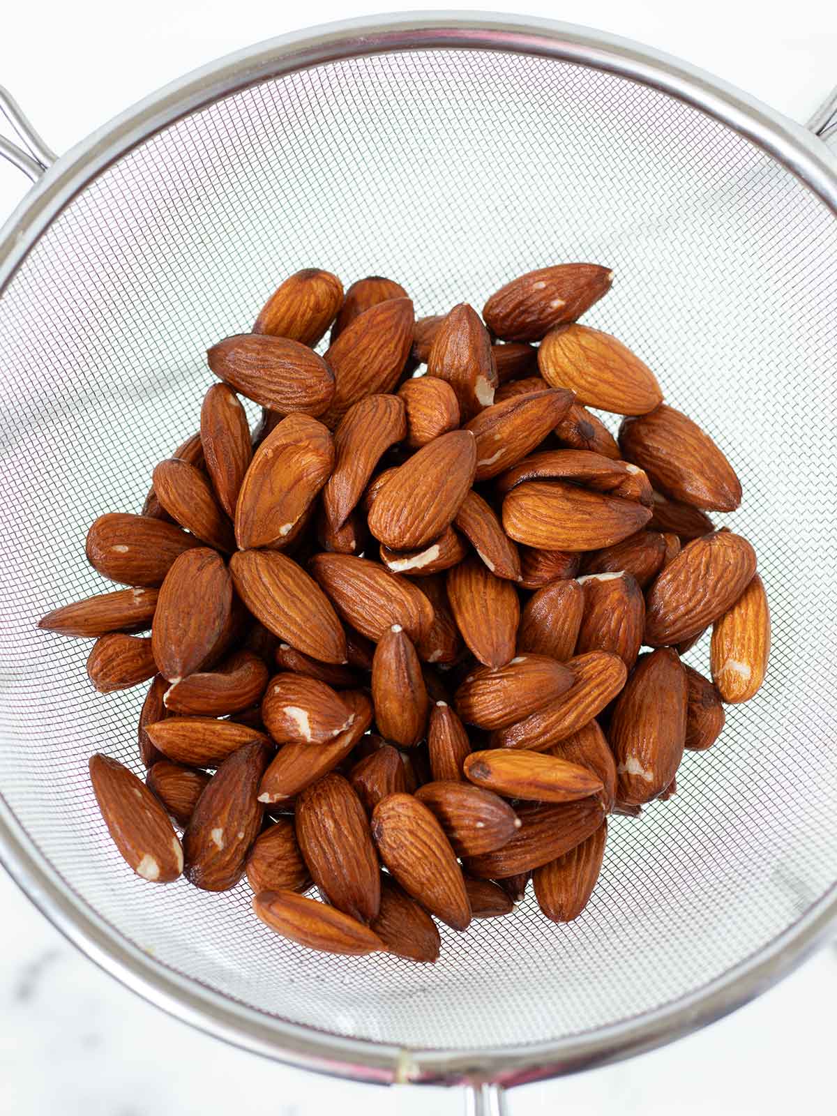 Soaked raw almonds for dairy-free nut milk.