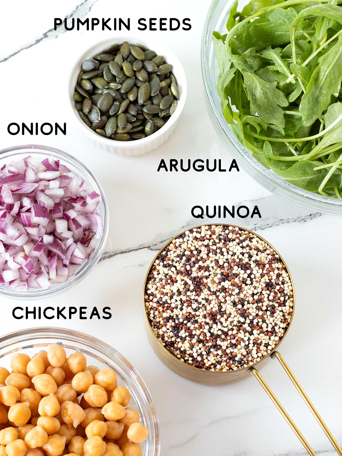 Ingredients for chickpea arugula quinoa salad.