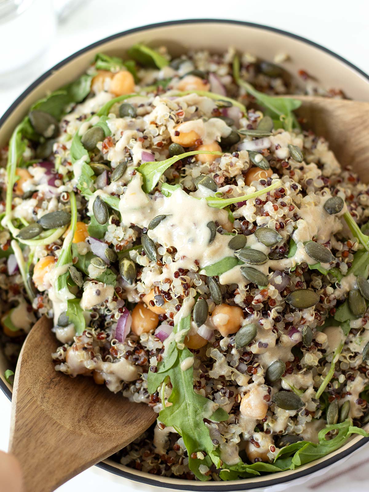 Chickpea garbanzo quinoa salad with lemon tahini dressing.