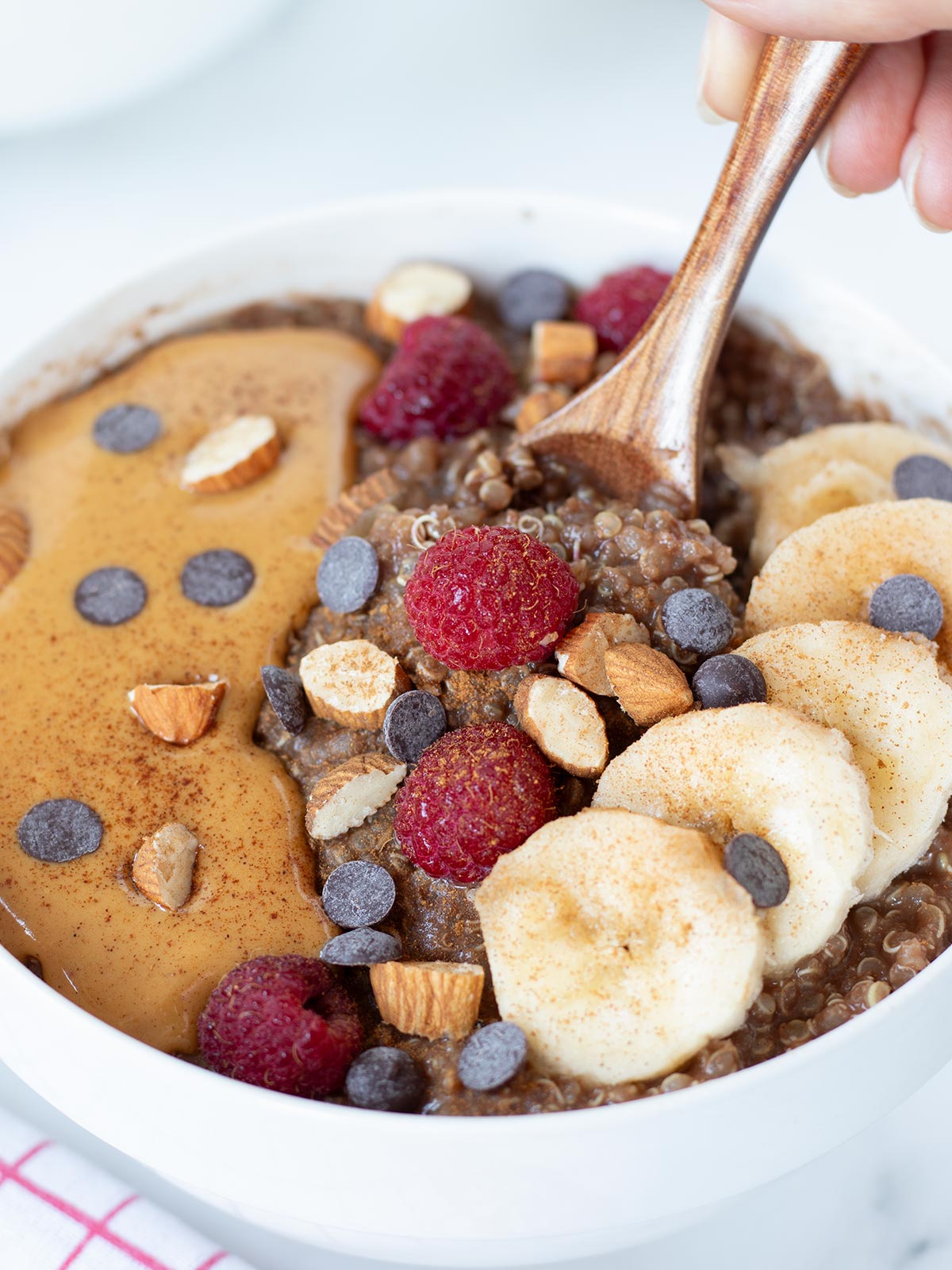 Vegan chocolate quinoa porridge for high-protein breakfast.