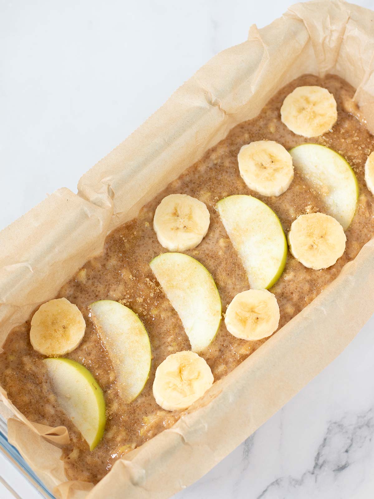 Cinnamon banana apple bread prepared for baking.