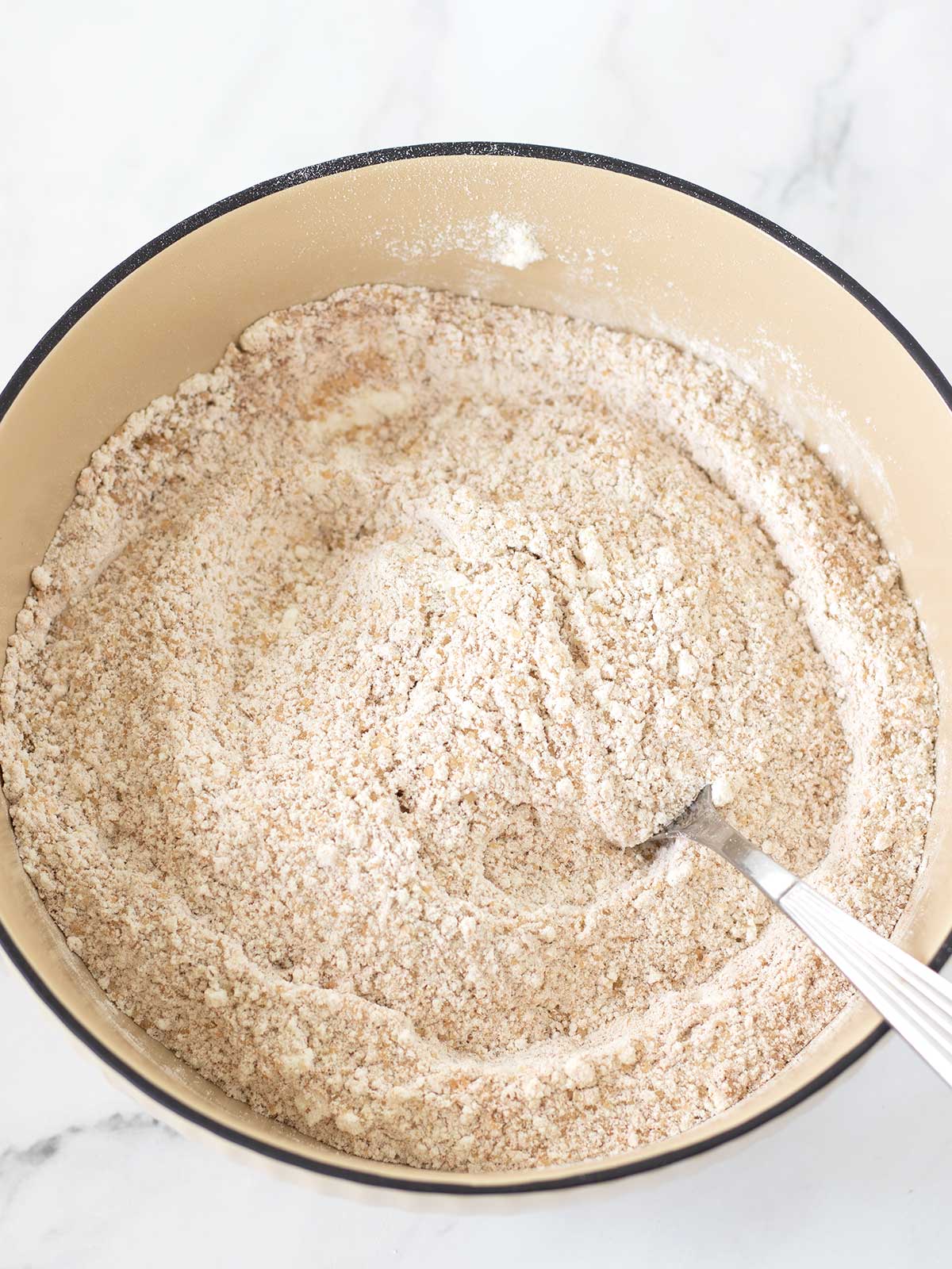 Dry ingredients for banana apple cinnamon bread.