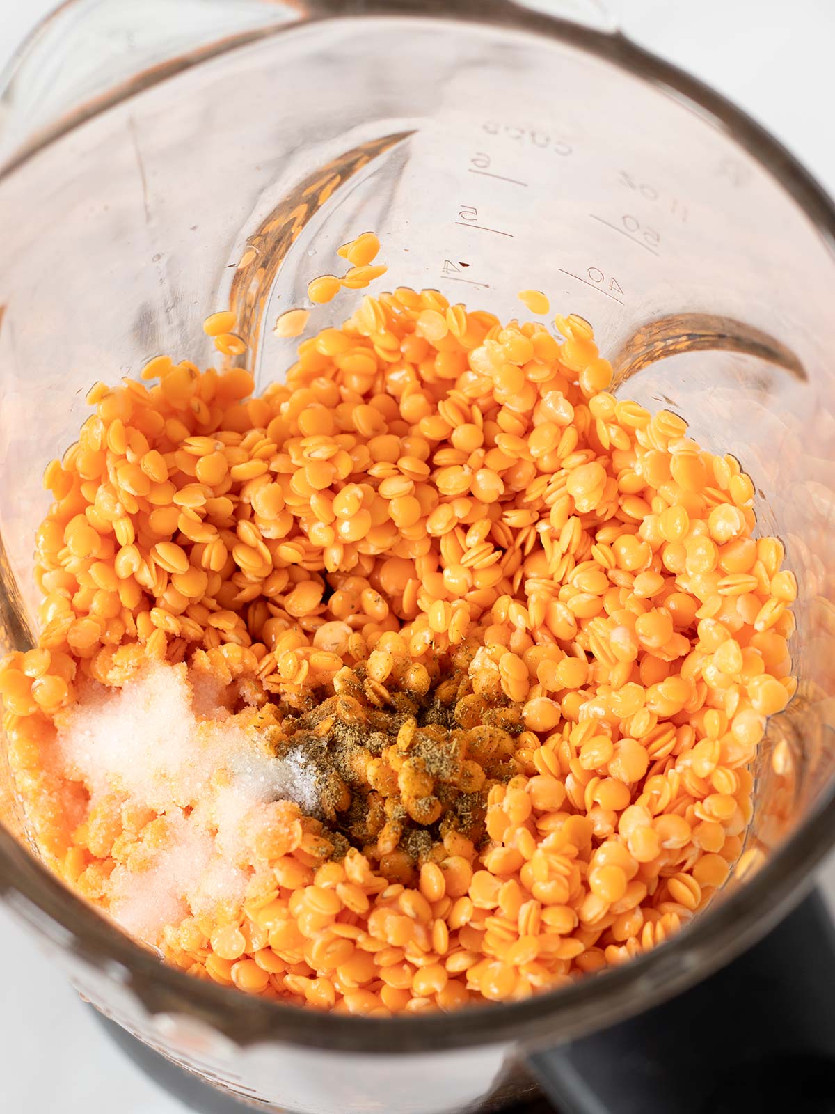 Red lentils bread ingredients in a blender.