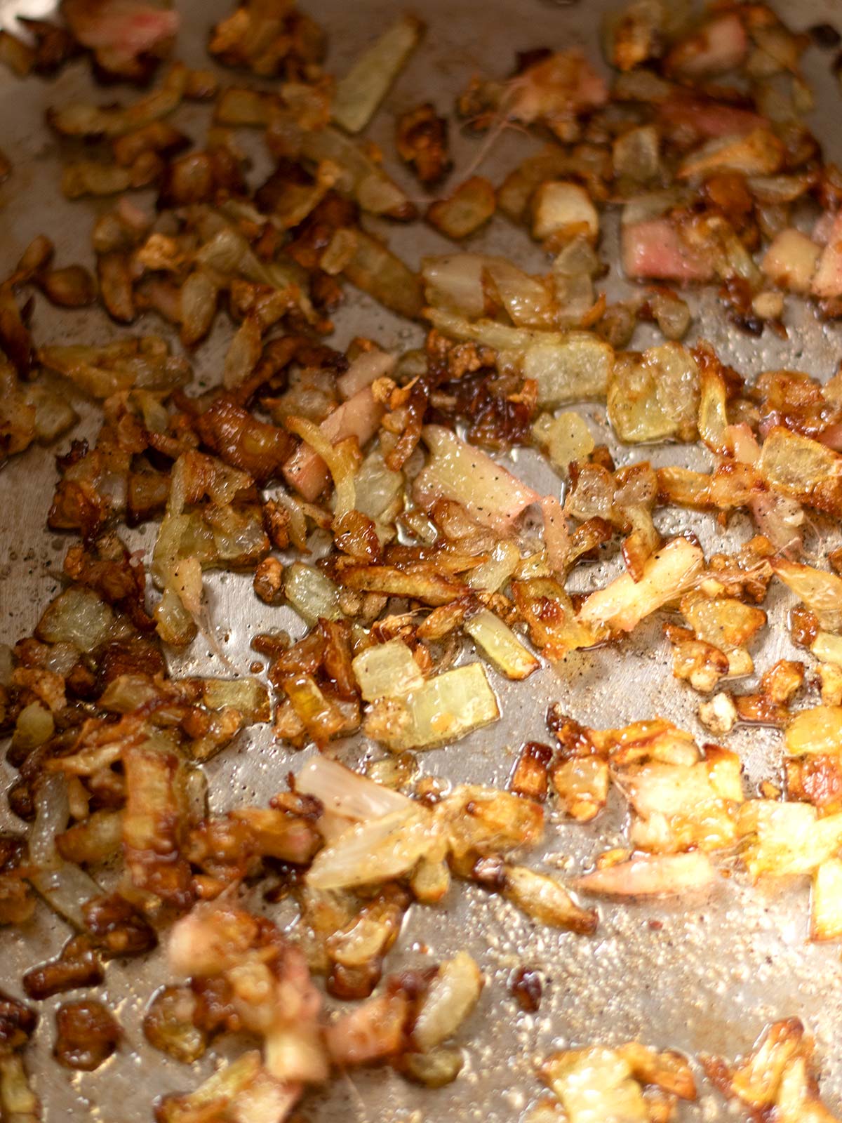 Cooking aromatics for beetroot carrot soup.